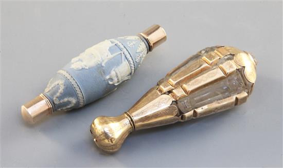 A gold mounted cut glass scent bottle, probably c.1850, 3 7/8in.